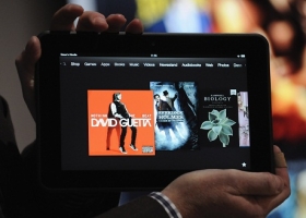 An employee demonstrates the new Kindle Fire HD 8.9" at Amazon's Kindle Fire event in Santa Monica, California September 6, 2012. 